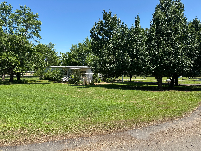 McAlester House: 70 Palm Rd - White Mobile Home