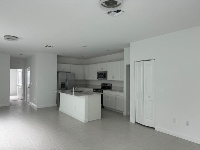 Greenacres Townhome: 4663 Hollister Avenue