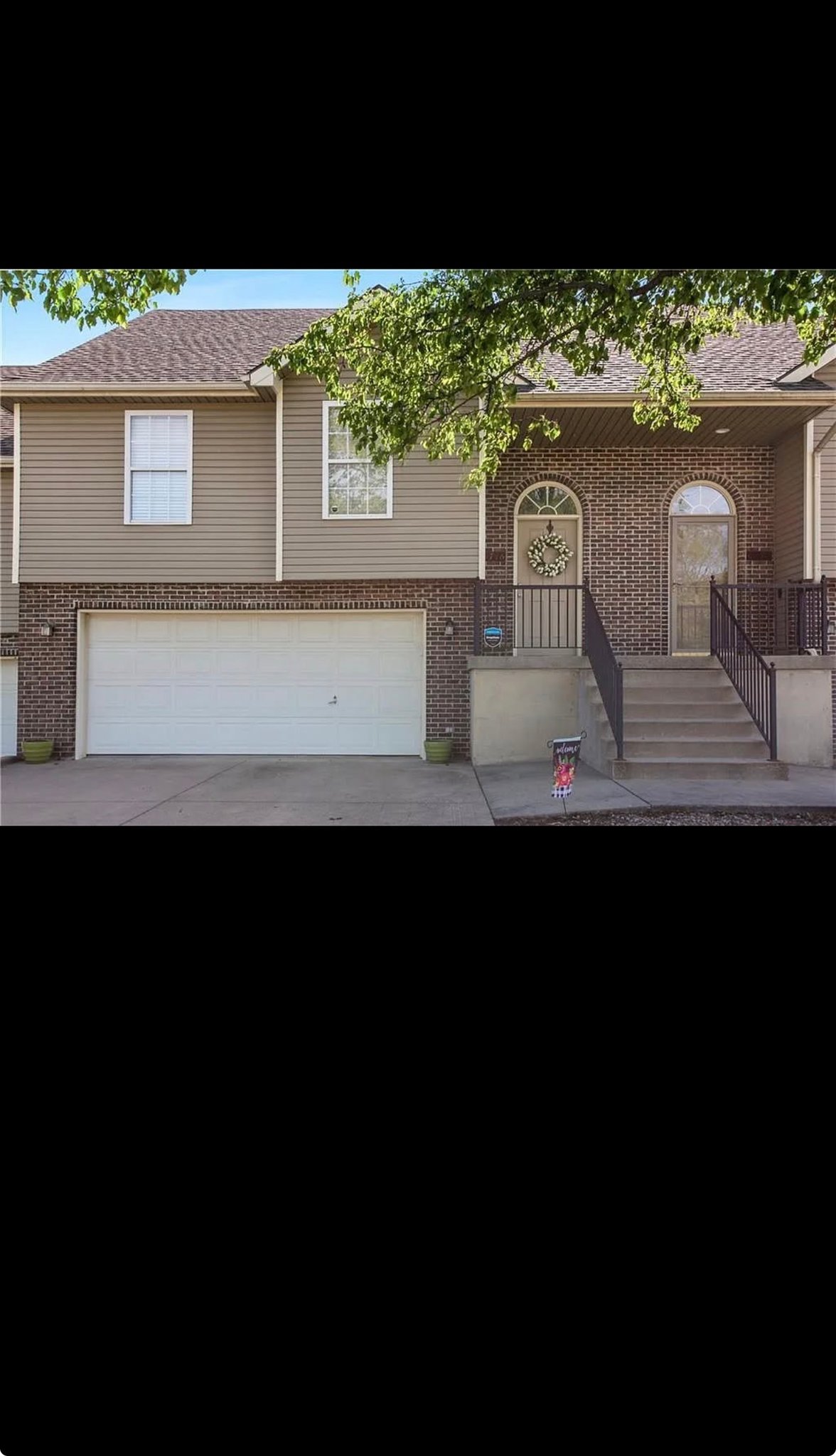 Kansas City Townhome: 8716 N Cleveland Ave