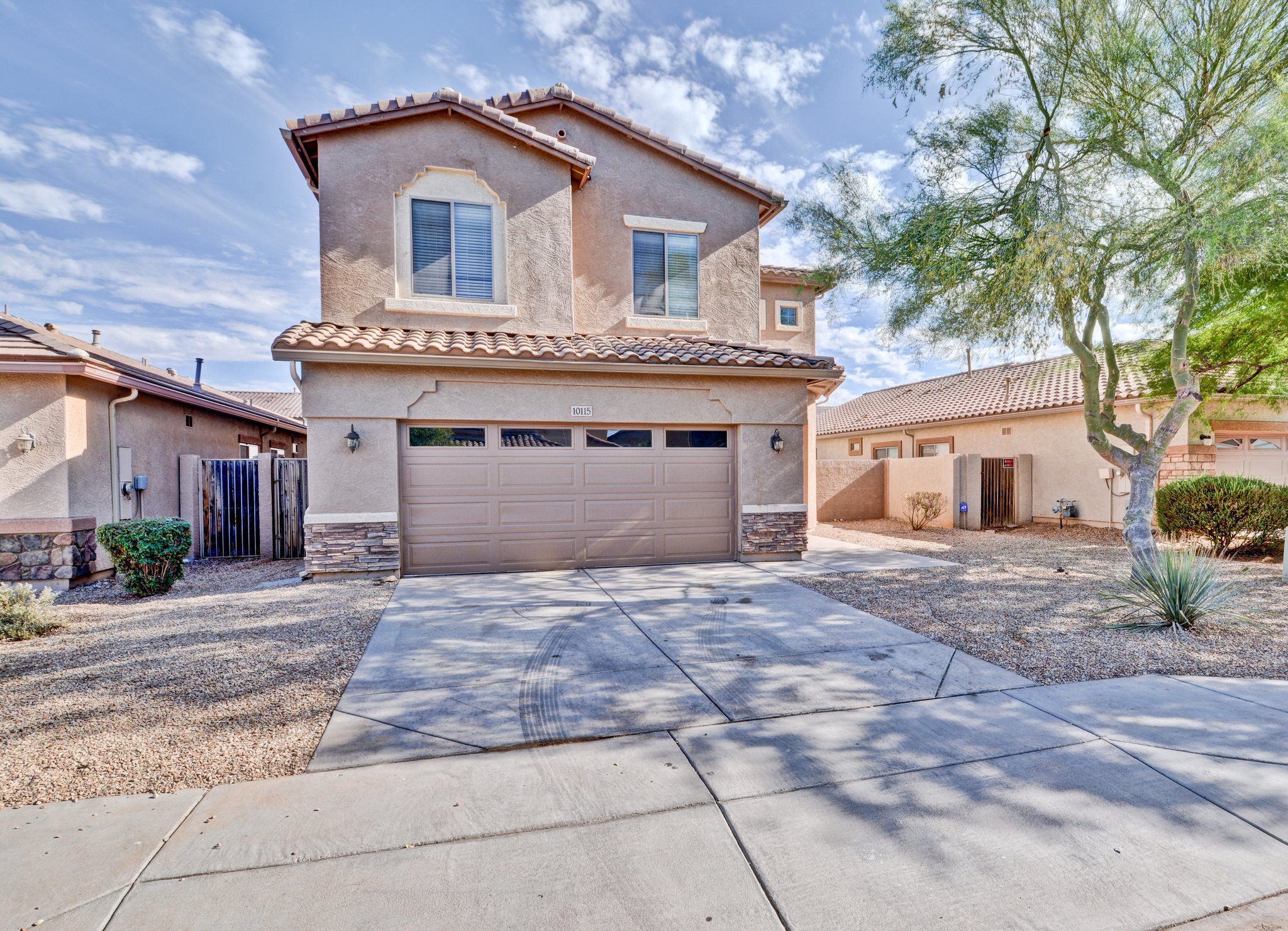 Tolleson House: 10115 W Parkway Dr