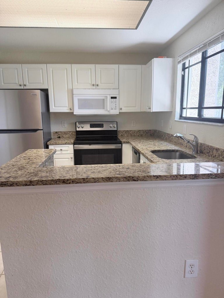 Palm Beach Gardens Townhome: 2812 GRANDE Parkway 106
